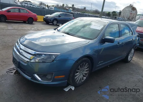 2011 Ford Fusion Hybrid from USA, damaged, VIN 3FADP0L32BR215231
